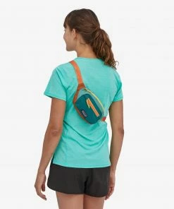 Patagonia ACCESSORIES Ultralight Black Hole Mini Hip Pack 1L - Patchwork 11 Patagonia ACCESSORIES Ultralight Black Hole Mini Hip Pack 1L - Patchwork