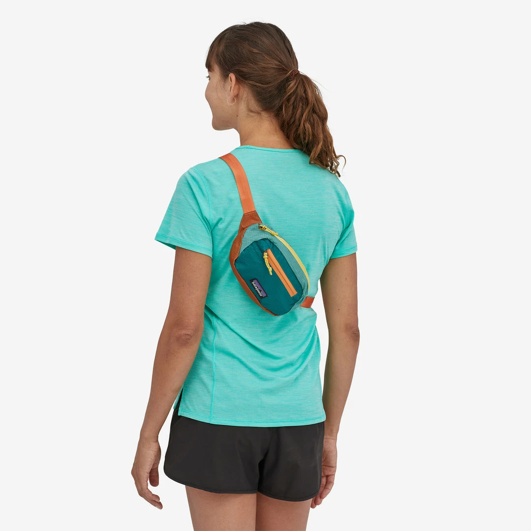 Patagonia ACCESSORIES Ultralight Black Hole Mini Hip Pack 1L - Patchwork 4 Patagonia ACCESSORIES Ultralight Black Hole Mini Hip Pack 1L - Patchwork